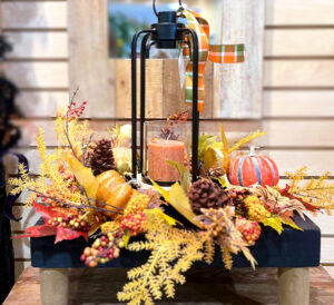 Fall Decor, lantern in the middle with fall foliage