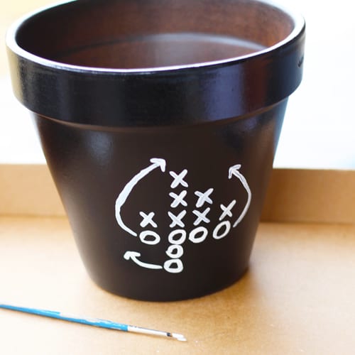 paint pottery with xs and os