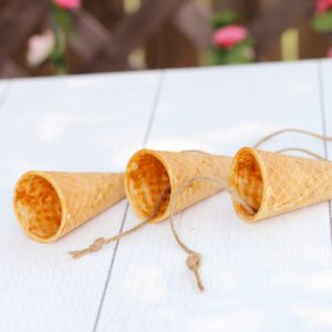 knot string through cone