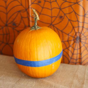 painter's tape on pumpkin
