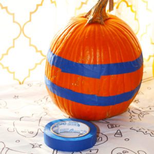 painter's tape on pumpkin
