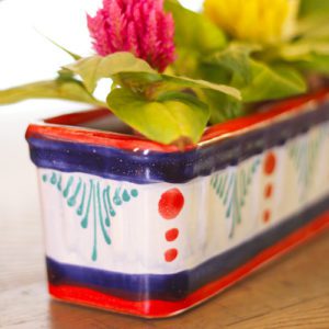 close up of hand painted pottery